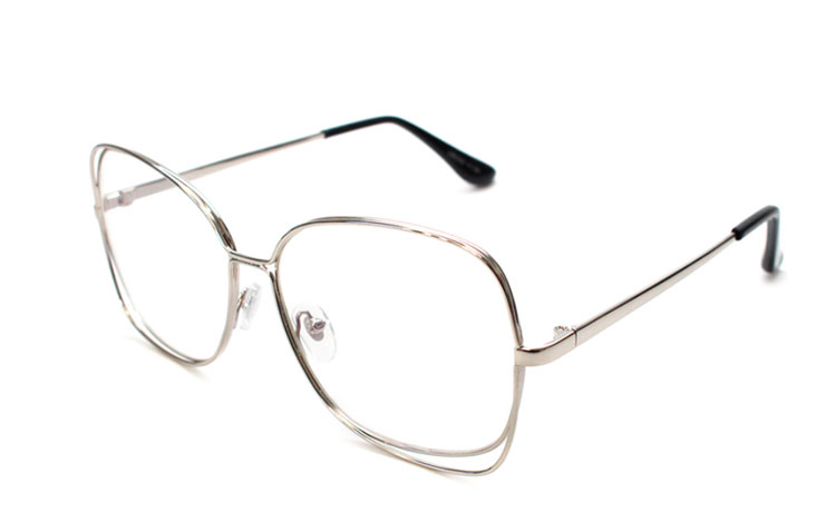 Stor sølvfarvet brille med dobbeltstel.
